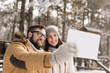 © Impact Photography - Couple taking selfie in the snow