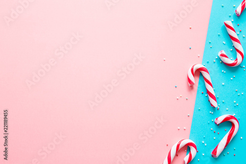 Red And White Candy Canes On Pastel Pink And Turquoise Blue Tone Paper Background Greeting Card Mockup For Positive Idea Empty Place For Happy Funny Cheerful Text Quote Or Sayings Stock Photo