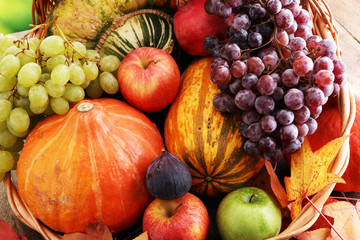  Autumn nature concept. Fall fruit and vegetables on wood. Thanksgiving dinner.