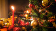 © Kyrylo Ryzhov - Closeup image of beautiful golden and red baubles hanging on Christmas tree branches