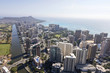 downtown oahu from the air with sea mountains and waterways