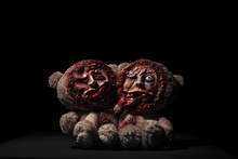 Halloween Toy. Bears Siamese Twins. On A Black Background