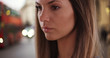 © rocketclips - Close-up of millennial girl in her 20s looking pensive outside in London street