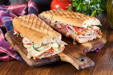 Poster - Toasted sandwiches with ham, cheese and other