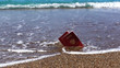 © serperm73 - Hot summer day and sandy beach background. In the foreground there are two Russian passports on the sand. Inscription - Russian Federation.