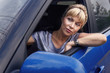 © westermak15 - portrait of a young attractive woman sitting in the car.