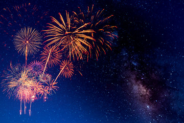 Wall Mural - fireworks with blur milky way background