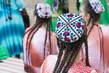 Wall Mural - Folk dancers performs traditional dance at local festivals in Khiva, Uzbeksitan.