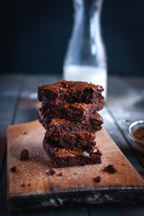 Close-up of homemade chocolate brownies on cutting board