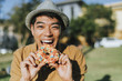 © Rawpixel.com - Happy man having a doughnut