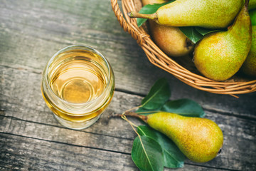 Wall Mural - Pear juice and pears on the table