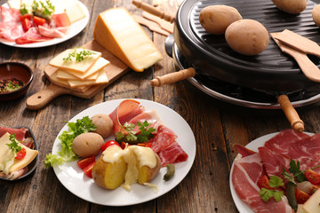 Wall Mural - raclette cheese with potato