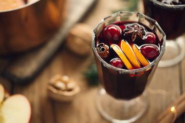 Mulled wine in glasses on blue table