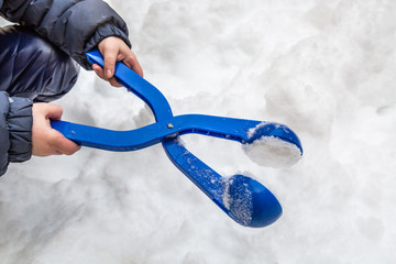 Toy snowball maker. Winter entertainment.