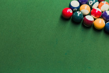 Close Up Of Pool Billiards Snooker Balls On Green Table With Setup Position.