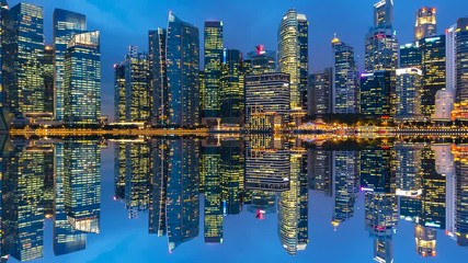 Fototapete - Time lapse of cityscape and reflections at night in Singapore. 4K