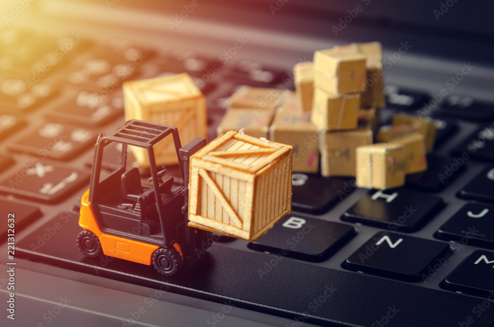 Fotografie, Obraz forklift freight car truck loading goods product wooden boxes and parcel on lapt