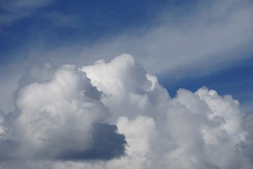 Amazing cumulus clouds and sunlight on the background of clear blue sky, Summer in GA USA.