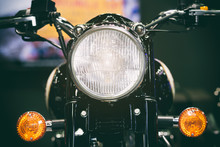Close-up View Of Motorcycle Headlight. Vintage Classic Motorcycle Headlight Or Head Lamp.