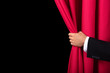 Two Men Opening Red Curtain