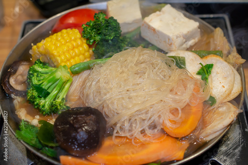 Fotografie, Obraz Selective focus on rice noodles of Tawanese vegetarian boiling pot ready to eat,