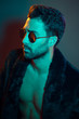 © Roberto Vivancos - Portrait of young man in leather jacket and sunglasses