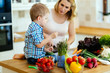 © NDABCREATIVITY - Mother and child preparing lunch