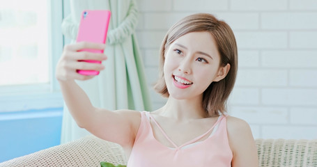 Poster - woman use phone selfie