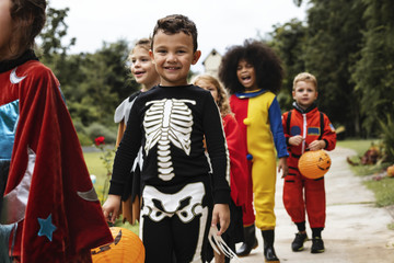 Wall Mural - Young kids trick or treating during Halloween