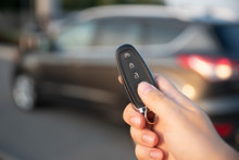 Man Opening Car With The Control Remote Key
