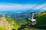 Fototapeta Las - cable car on the ropes, going to Mount Kasprowy Wierch, Poland. Beautiful view of the valley
