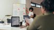 © Jacob Lund - Woman giving presentation over new app development