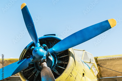 Fotografia, Obraz engine, fuselage and propeller of the airplane against the blue sky