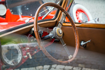 Interior view of classic vintage car. Beautiful retro car poster, postcard.