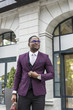 © xartproduction - stylish businesswoman with briefcase on city background. African American man talking on mobile phone