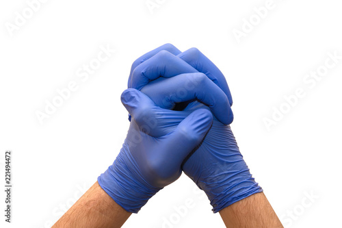 Fotografia, Obraz Closeup of a male hand in a blue medical glove showing making sign