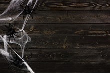 Halloween Spider Web Side Border Against A Dark Wooden Background With Copy Space