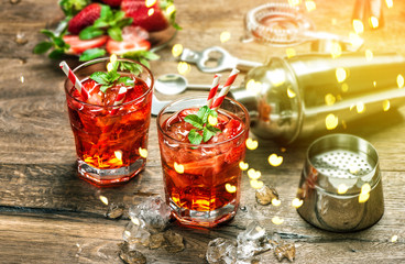 Red drink Aperitif mojito caipirinha juice Vintage style bokeh