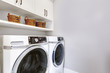 © Iriana Shiyan - White clean laundry room modern with washer and dryer