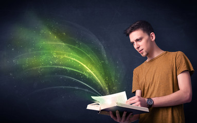 Poster - Casual young man holding book with green wave flying out of it