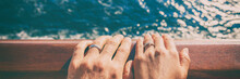 Wedding Bands Newlyweds Couple On Honeymoon Travel On Cruise Ship Boat. Closeup Of Hands Against Ocean Sea Background. Panoramic Banner.