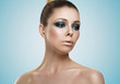 © akvafoto2012 - Portrait of attractive girl on a gray background. Beautiful makeup, perfect skin. Girl looking away