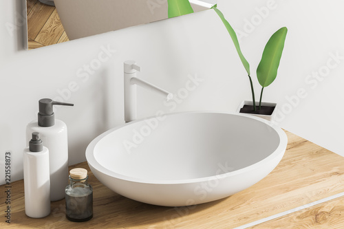 Fotomural Close up of sink on wooden vanity unit, white