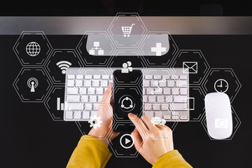 Coding software developer work with augmented reality dashboard computer icons  with responsive cybersecurity.Businessman hand working.