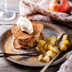 Wall Mural - Buckwheat pancakes with poached apples and cream.