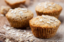 Healthy Vegan Oat Muffins, Apple And Banana Cakes On A Wooden Background. Copy Space.
