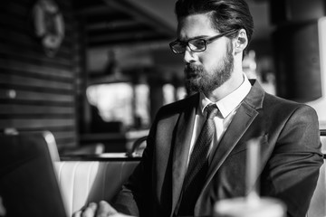 Blac and white photo of a businessman.