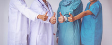 Doctors And Nurses Coordinate Hands.doctors Thumb Up, Concept Teamwork