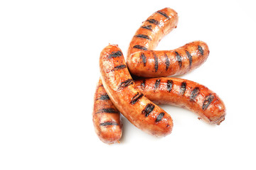 grilled sausages on white background