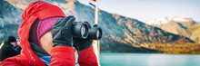 Alaska Cruise Travel Tourist Whale Watching On Boat Shore Excursion Ride At Glacier Bay Landscape. Woman Looking At View Binoculars On Cruise Ship. Panoramic Banner Portrait.
